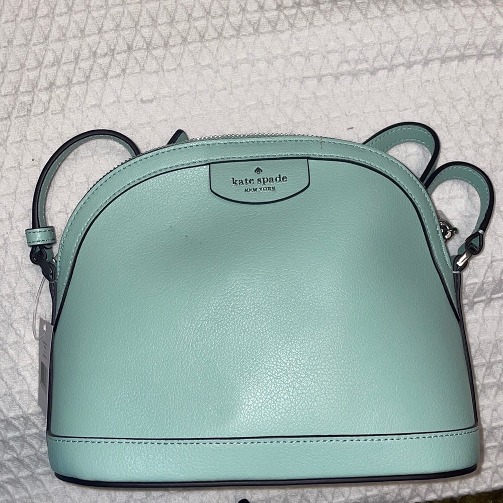 Never used, minor dent from being stored